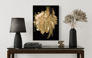 a table with a lamp and a painting on it