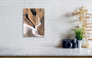 a white brick wall with a painting on it