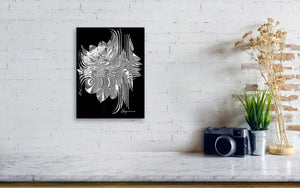 a black and white painting on a white brick wall
