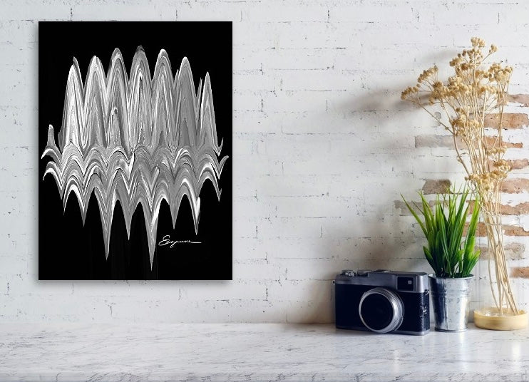 a black and white photo of a wavy pattern