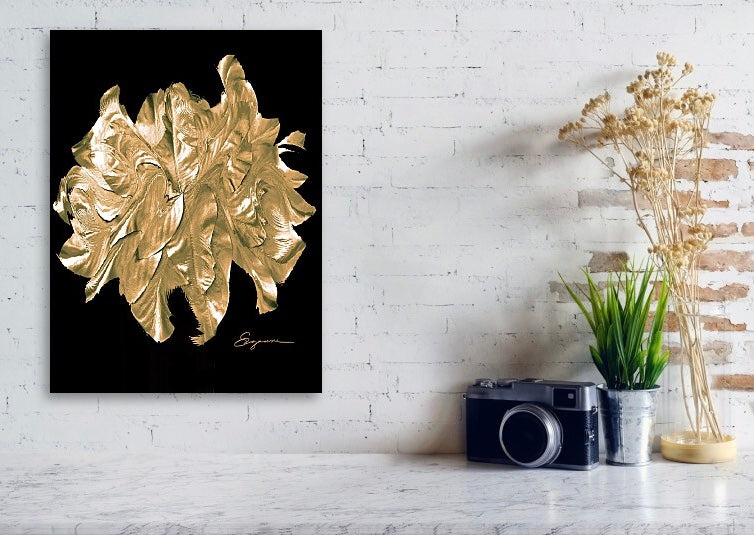 a golden flower on a black background
