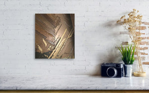 a white brick wall with a painting on it